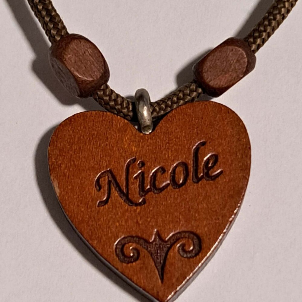 Wooden heart necklace with the name Nicole